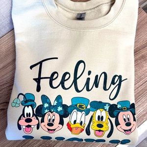 Sweatshirt-St. Patrick’s Day Disney print. 2 medium, 1 small. Unisex brand new.